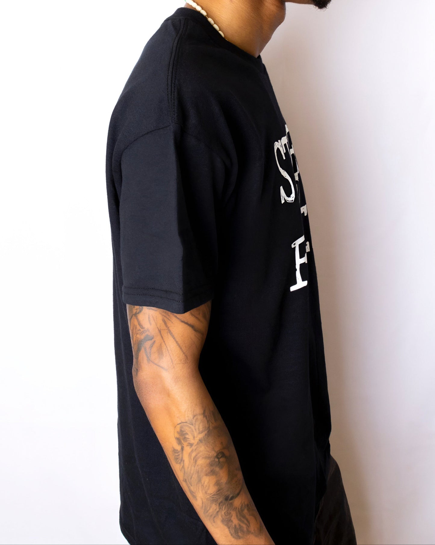 BLACK 'STRESS FREE' T-SHIRT